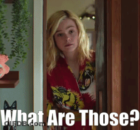 Woman In Red Shirt In Doorway Saying What Are Those GIF