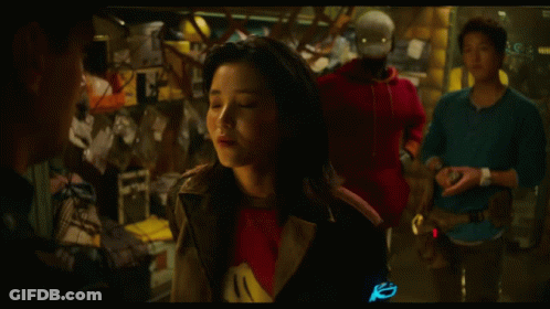 Woman In Red Shirt Looking Up GIF