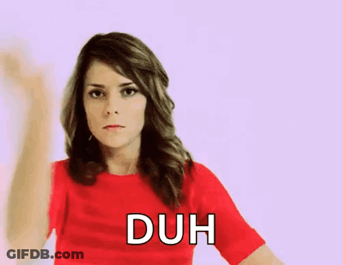 Woman In Red Shirt Making Duh Gesture GIF