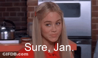 Woman In Red Shirt Making Funny Face GIF