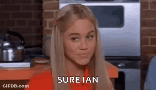 Woman In Red Shirt Making Funny Face GIF