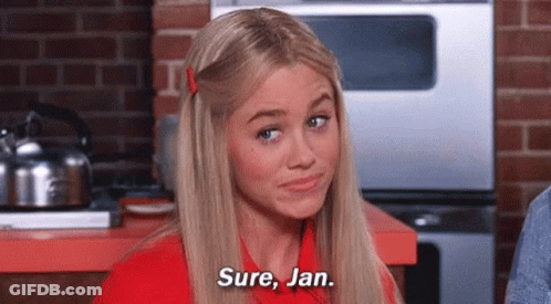 Woman In Red Shirt Making Funny Face GIF