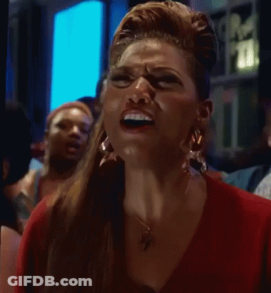 Woman In Red Shirt Making Funny Face GIF
