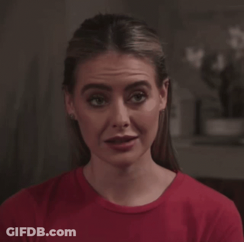 Woman In Red Shirt Making Silly Face GIF