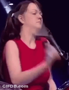 Woman In Red Shirt Playing Drum Set GIF