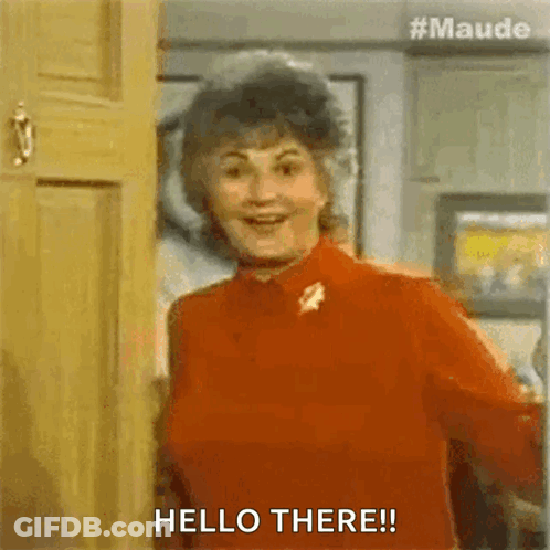 Woman In Red Shirt Saying Hello There GIF