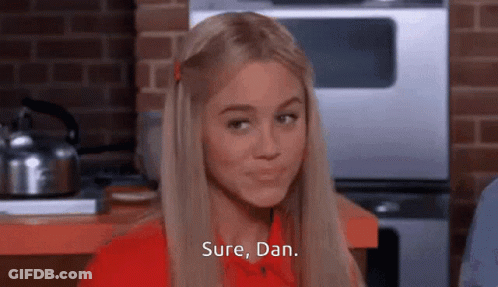 Woman In Red Shirt Saying Sure Dan GIF