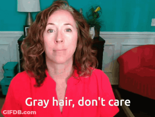 Woman In Red Shirt Says Gray Hair Don Care GIF