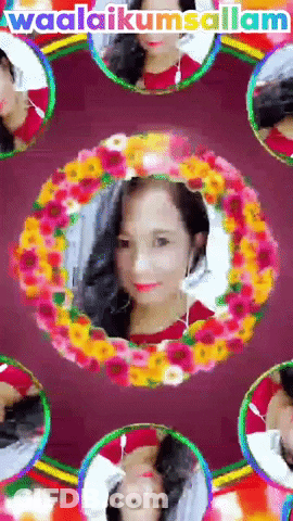 Woman In Red Shirt Surrounded By Flowers Saying Waddukumsalam GIF