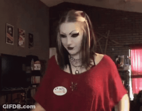 Woman In Red Shirt With I Love You Badge GIF