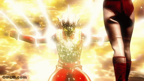 Woman In Red Shorts Next To Superhero With Arms Outstretched GIF