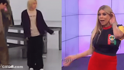 Woman In Red Skirt And Man In Black Shirt GIF