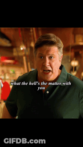 Woman In Red Suit Next To Woman In White Shirt GIF