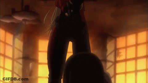Woman In Red Suit Standing Next To Man GIF