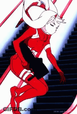 Woman In Red Suit Walking Down Stairs GIF