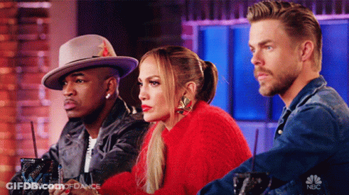 Woman In Red Sweater Between Two Men In Hats On World Of Dance GIF
