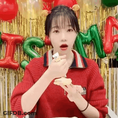 Woman In Red Sweater Eating Cake GIF