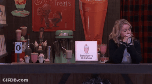 Woman In Red Sweater Hugging Another Woman GIF