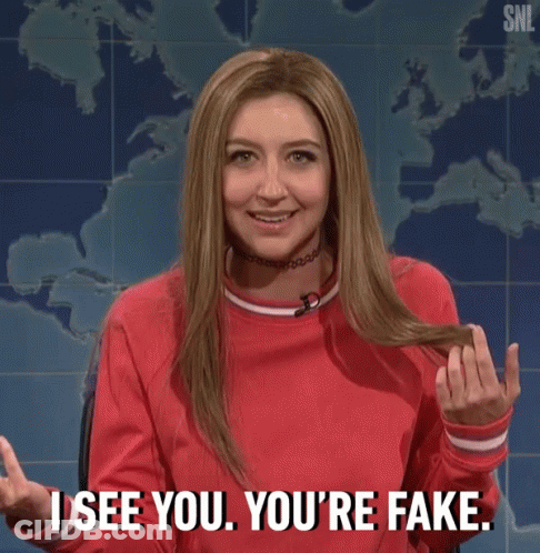 Woman In Red Sweater Saying I See You You're Fake GIF