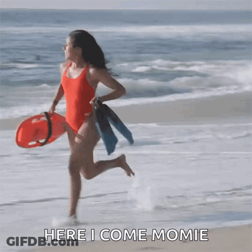 Woman In Red Swimsuit Runs With Life Preserver And Flippers GIF