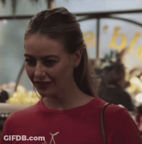 Woman In Red T-Shirt Saying A GIF