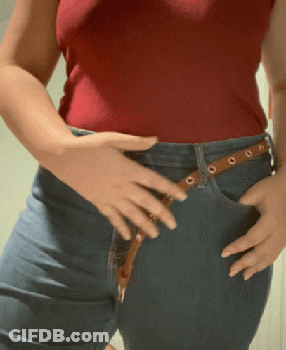 Woman In Red Tank Top And Blue Jeans GIF