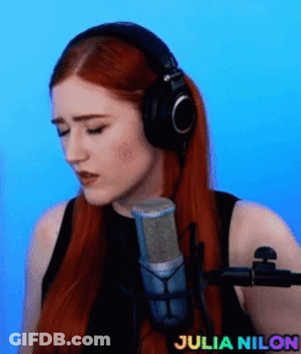 Woman In Red Tank Top Open Mouth Pink Wall GIF