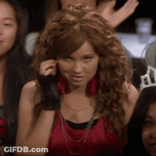 Woman In Red Top And Black Glove GIF