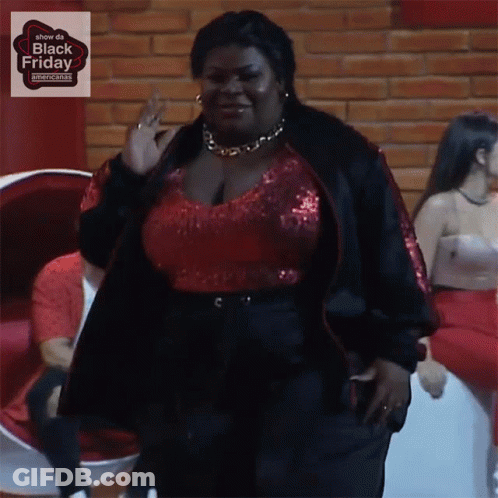 Woman In Red Top And Black Jacket Black Friday Sign GIF