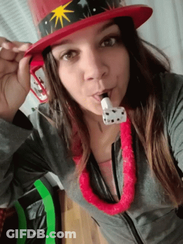 Woman In Red Top Hat With Star Blowing Horn GIF