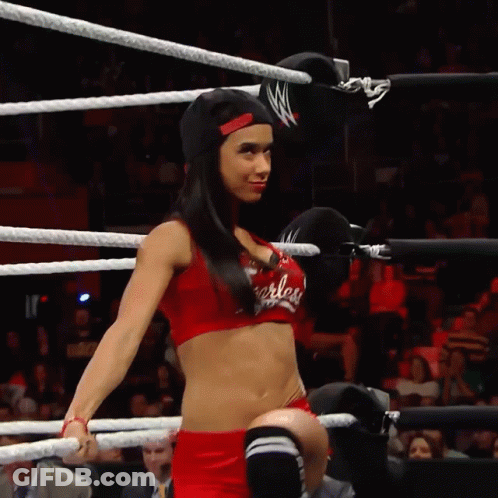 Woman In Red Top Saying Fearless In Wrestling Ring GIF