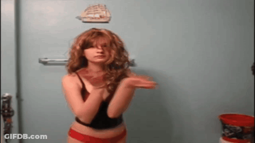 Woman In Red Underwear By Blue Wall With Boat GIF