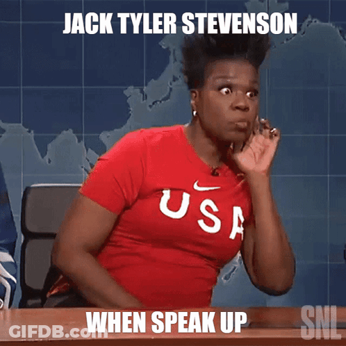Woman In Red USA Shirt Sitting At Desk GIF