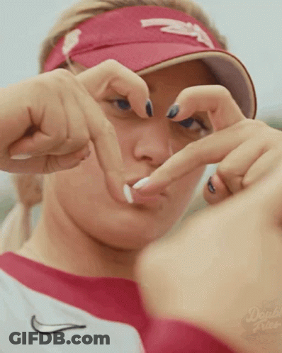 Woman In Red Visor And White Shirt With Double Fries GIF