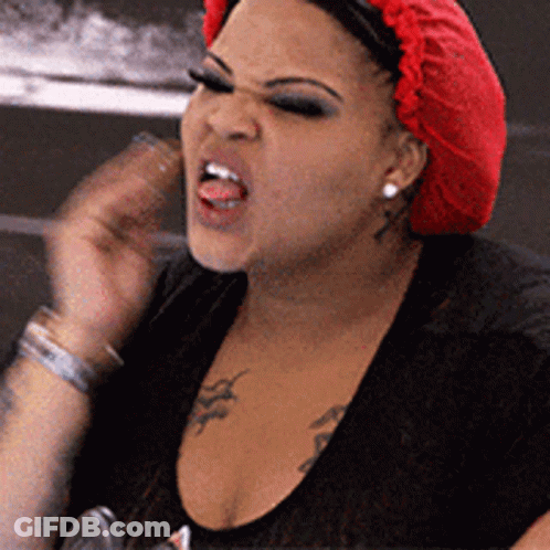 Woman In Red Wig Black Shirt Funny Face GIF
