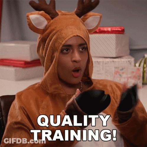 Woman In Reindeer Costume Holding Purse Saying Quality Training GIF