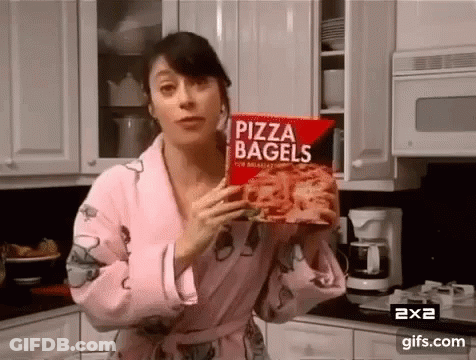 Woman In Robe Holding Pizza Bagels GIF