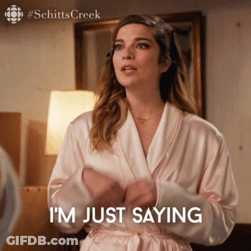 Woman In Robe Saying I'm Just Saying GIF