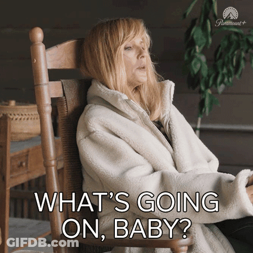 Woman In Rocking Chair Saying What's Going On Baby GIF