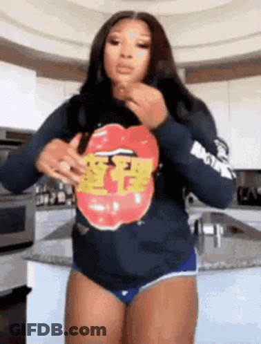 Woman In Rolling Stones Sweatshirt GIF