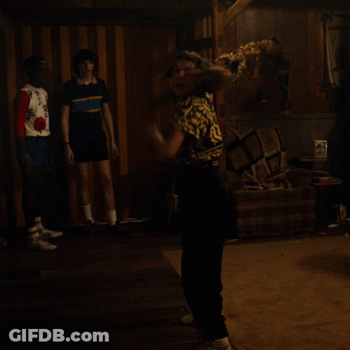 Woman In Room With Couch And Blanket GIF