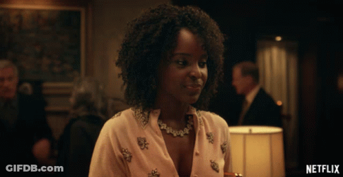 Woman In Room With Netflix Logo GIF