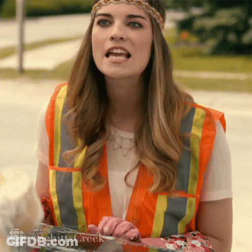 Woman In Safety Vest And Headband GIF