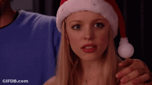Woman In Santa Hat Says Stop Trying To Make Immunity Debt Happen GIF