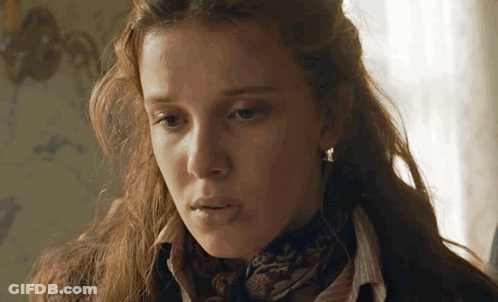 Woman In Scarf And Sweater Close Up GIF