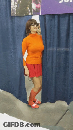 Woman In Scooby Doo Costume Behind Curtain GIF