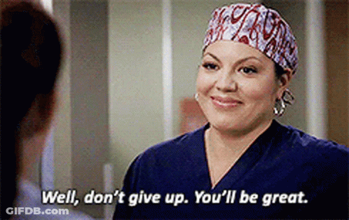 Woman In Scrub Hat Saying Well Don't Give Up You'll Be Great GIF