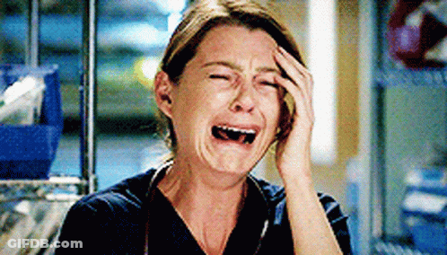 Woman In Scrub Top Crying GIF