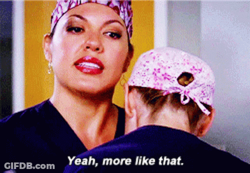 Woman In Scrubs Talking To Another Woman Saying Yeah More Like That GIF
