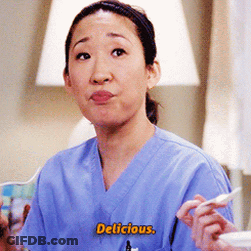 Woman In Scrubs With Delicious On Her Chest GIF